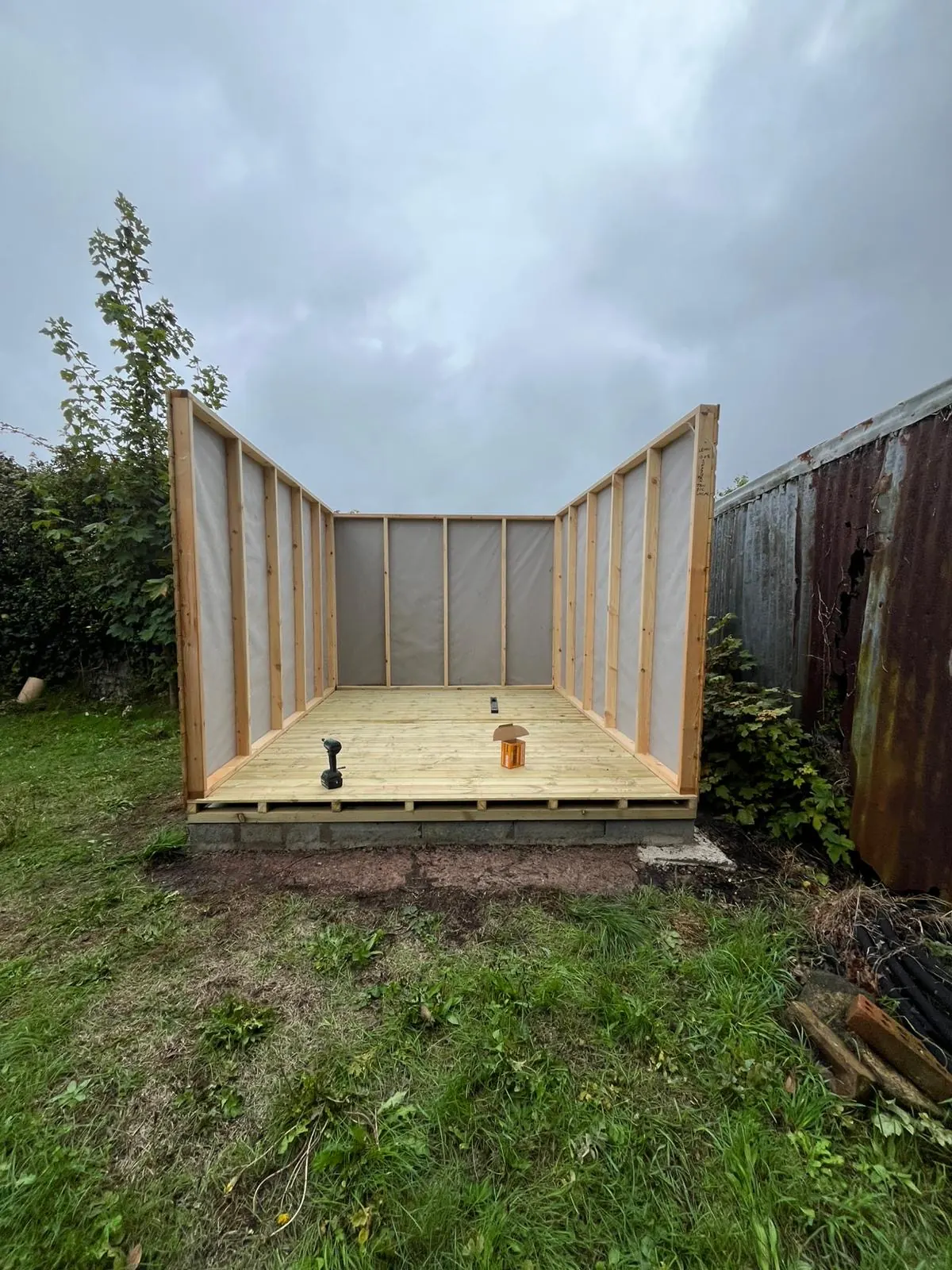 Timber garden shed walls assembled and ready for the roof