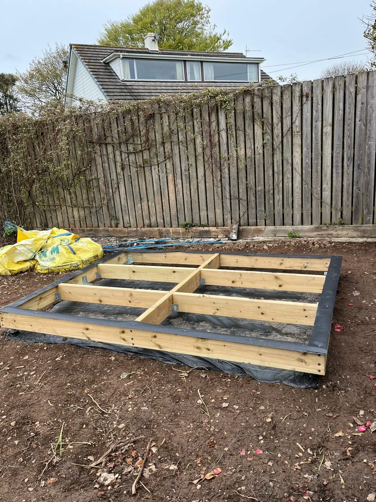 Small garden building timber base prepared on cleared ground
