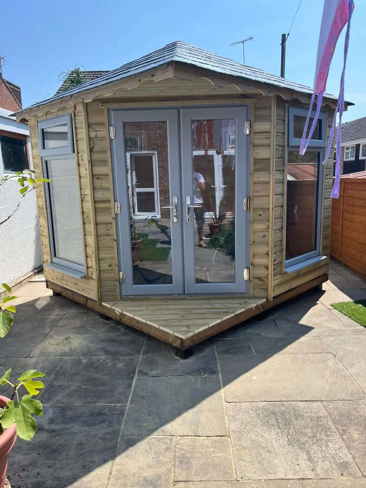Completed timber garden building installed by Base & Build in Cornwall